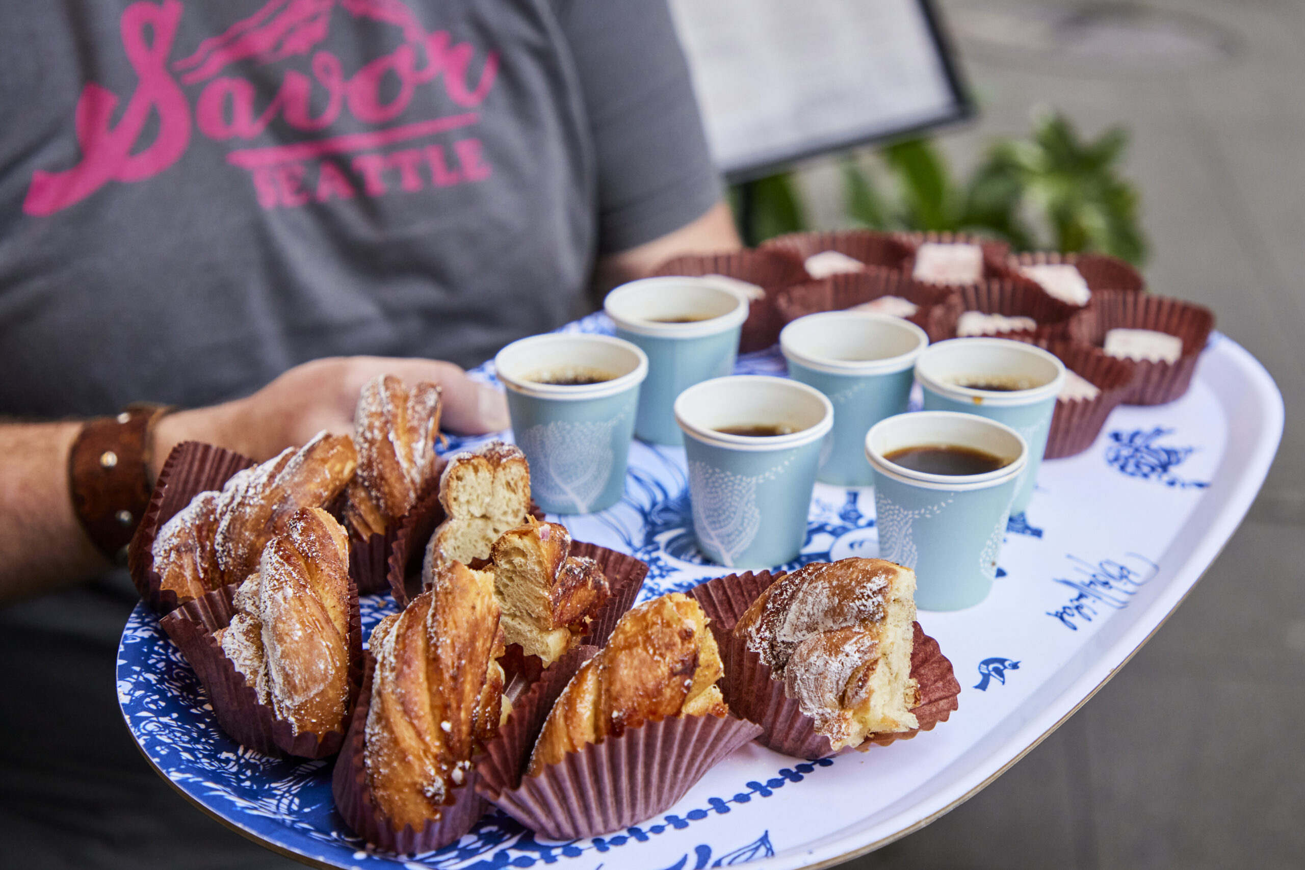 A tray of coffee and pastries from a pike place market food tour led by Savor Seattle Tours