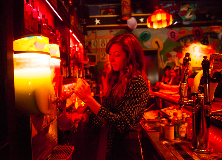 woman pouring drink